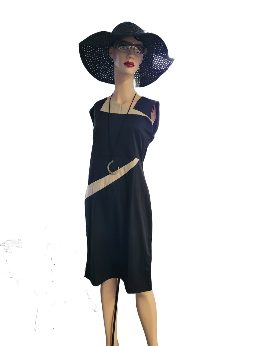 Macie found this stylish dress size 2 XL  that sells for $11.00.   Stop in and see our many other beautiful dresses for you to select from.
We are open Thurs.10 am - 6 pm, Fri. 10 am - 1 pm, and Sat. 10 am-3 pm. Thread of Life Thrift Store, 130 Oriskany Blvd. Whitesboro.