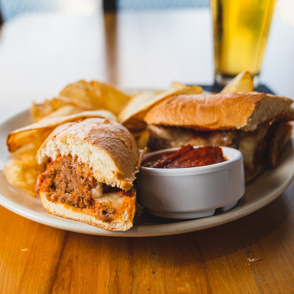 🥖💥 Warning: Our Meatball Hoagie has been known to cause extreme happiness. Indulge at your own risk! Packed with homemade brisket and pork meatballs, smothered in marinara, and melted mozzarella, it's dangerously delicious.

#NapaFlats #NapaFlatsWoodFiredKitchen #MeatballHoagie