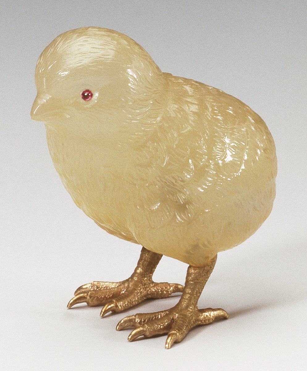 Chalcedony chick with cabochon ruby eyes and chased red gold feet. Mark of Henrik Wigström; gold mark of 72 zolotniks, 1907. Royal Collection.   

Commissioned by King Edward VII, 1907 (the Sandringham Commission)