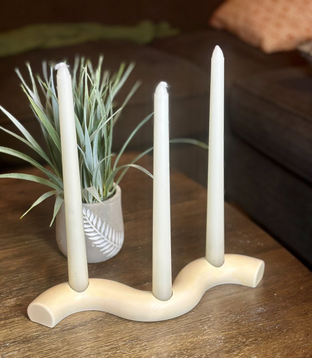 wavy candle holder 🕯️ 
comes with the candles! use code 'SummerSale' to get 30% off !!