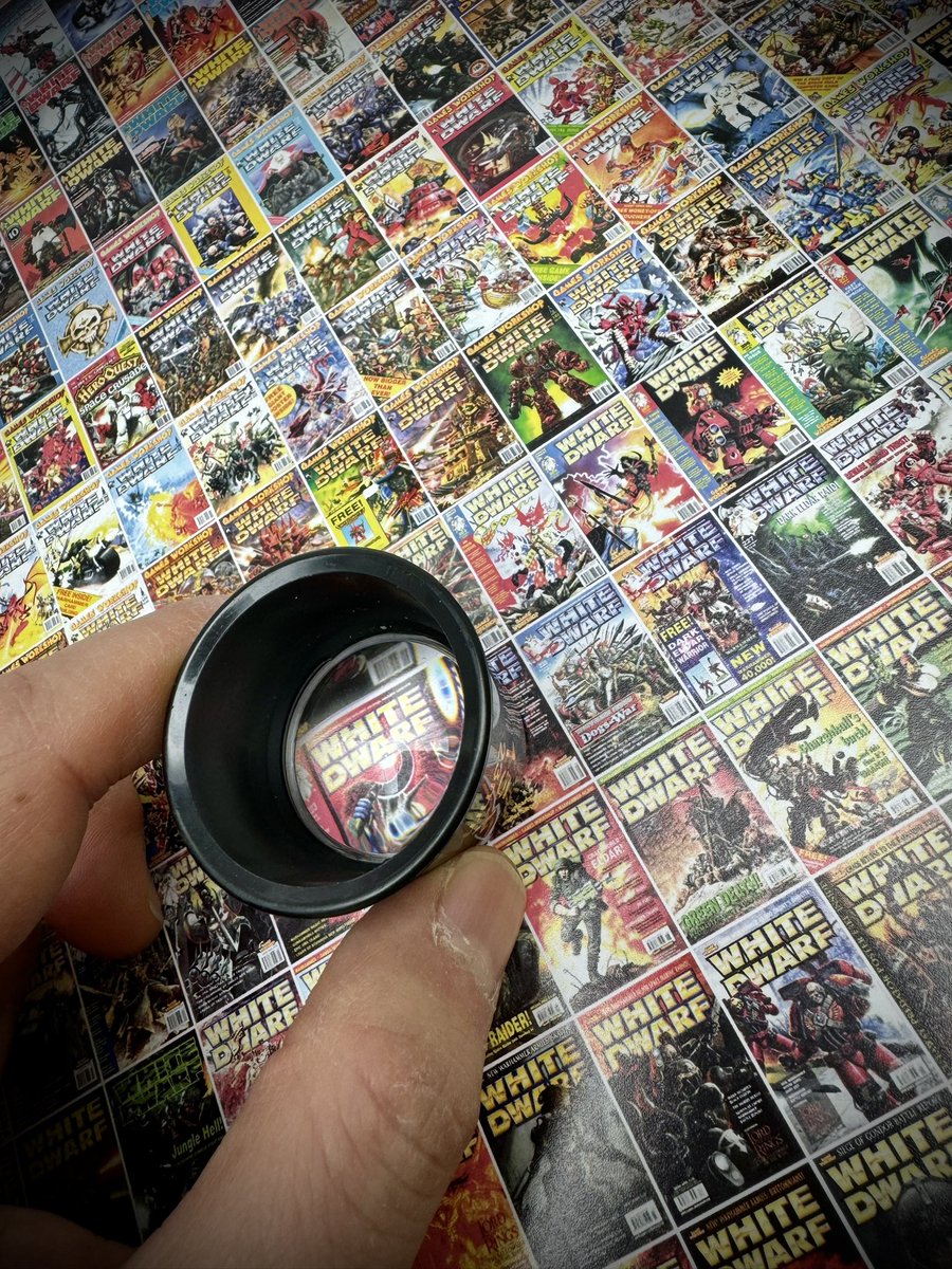 I took this photo during the making of White Dwarf 500. That’s 499 covers that needed inspection!