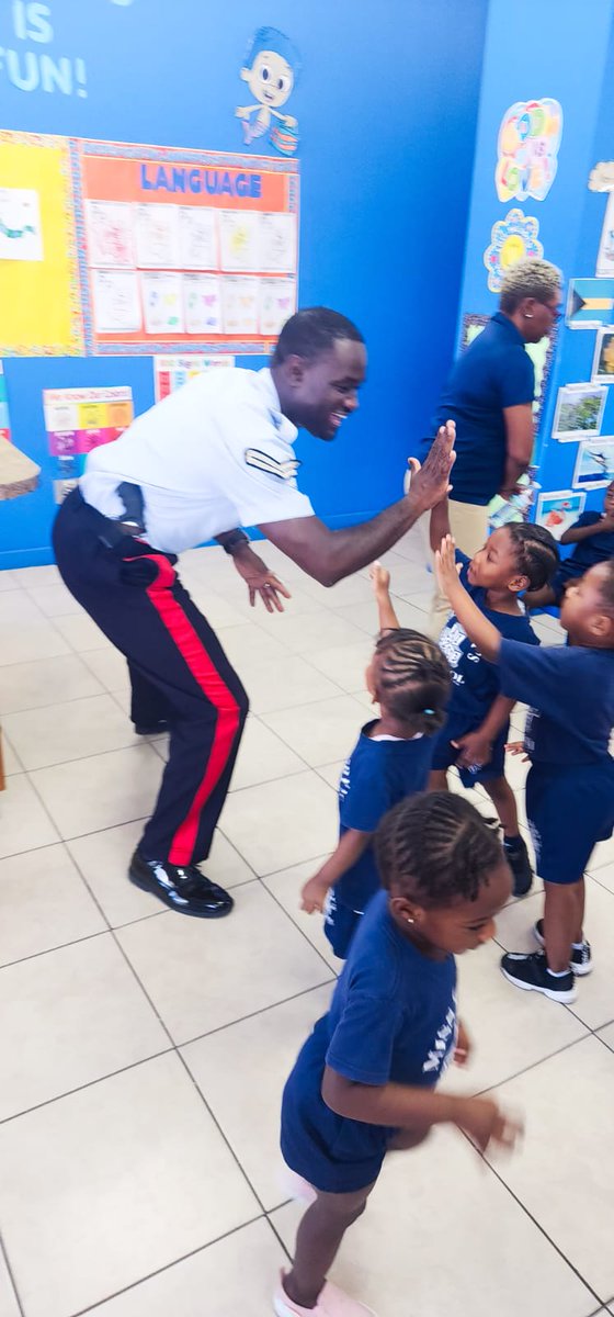 RBPF South Eleuthera Division visited Ms. Libbey's Preschool, emphasizing police as friends and good behavior. Officer Brown read stories, fostering community ties. #CommunityEngagement #ChildSafety