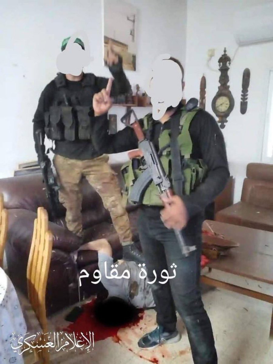 ⚠️ WARNING: disturbing image This image is from October 7. They murdered a civilian in his home. They stepped on his dead body and posed for a photo. This is Hamas. We do not forget how this war began and we do not forget what will happen if Hamas is not destroyed.
