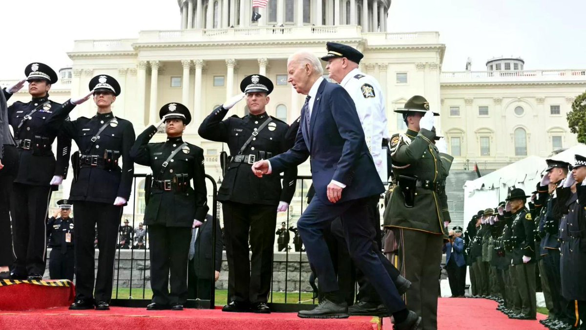Biden trips on stage at fallen officer's event newsweek.com/joe-biden-trip…