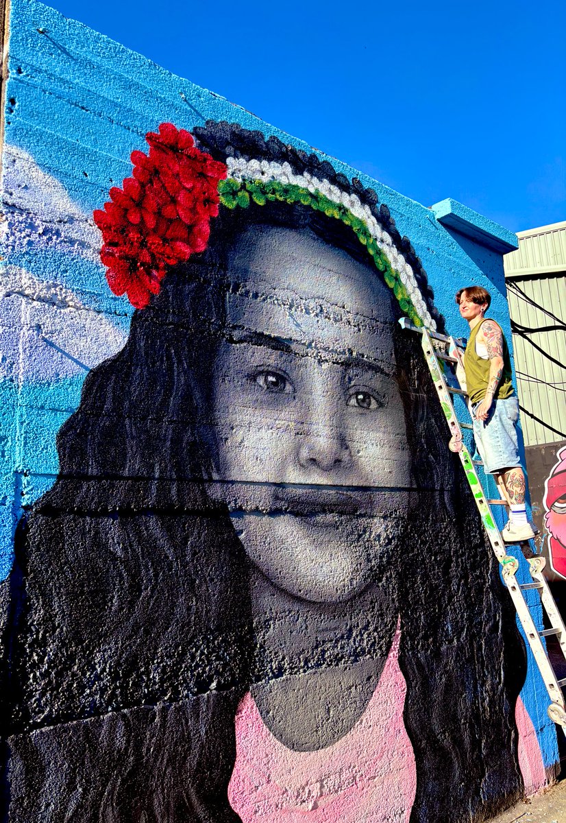 Outside the stadium a very special mural has just been completed by @emmaleneblake It is of Hind Rajab, a six year old girl who was murdered by the Israeli military, after being the sole survivor of Israeli tank fire on the vehicle in which she had fled with six relatives. Her