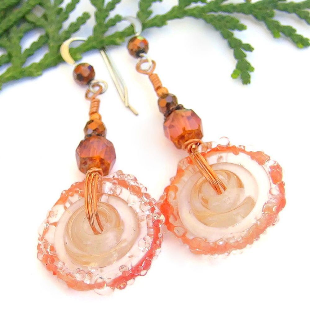 Fun jewelry for the boho woman: shades of peach artisan lampwork disc earrings w/ 'sugared' rims & Czech glass beads! buff.ly/3QMWRnk via @ShadowDogDesign #ejwtt #ShopSmall #BohoEarrings