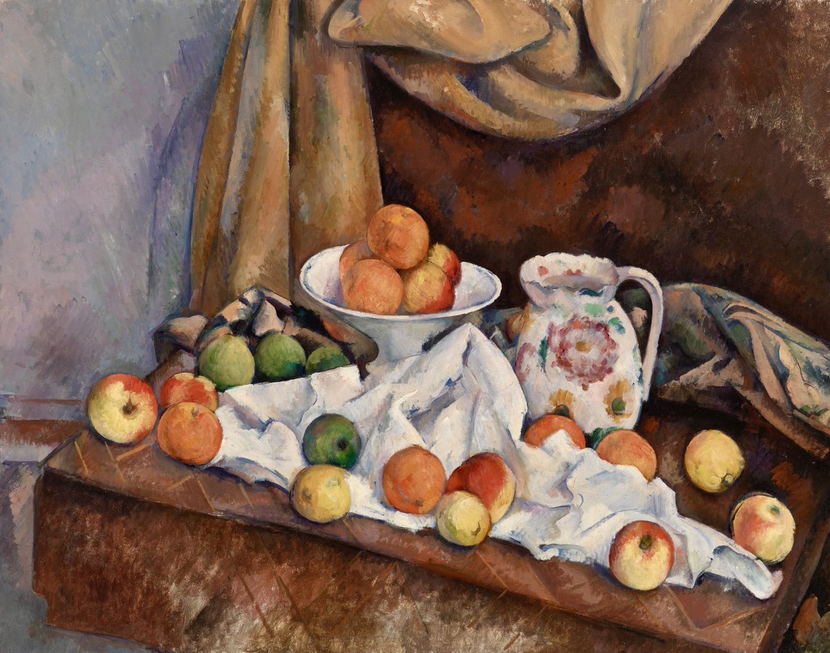 Paul Cezanne’s Still Life, Nature morte, is stunning. A vivid, varied color palette showcases many ordinary items, napkin, fruits and a vase. The draping in the white napkin keeps the fruit from falling off the table. The draping in the cloth above is infused with glorious color.