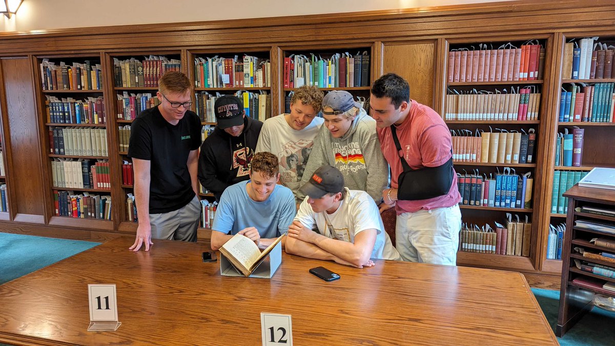 Live shot from the Burns Library Reading Room where 7 seniors have stopped by to look at our first edition of Isaac Newton's Philosophiae Naturalis Principia Mathematica. We love this as a #SeniorWeek activity!
