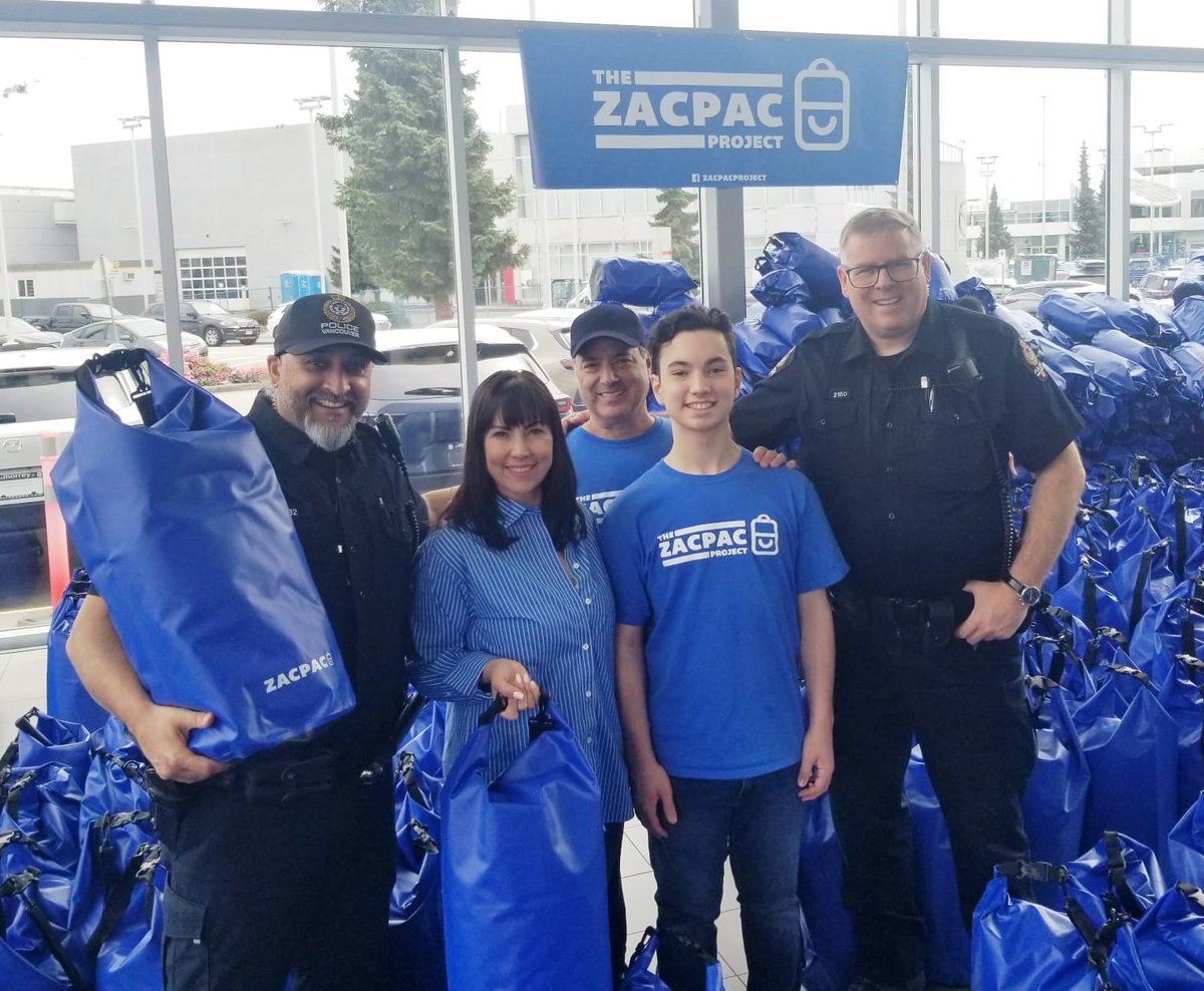 #VPD Constables Dhaliwal and Black recently picked up bags for distribution to people who are unhoused in Vancouver, as part of the #ZacPac Project. The waterproof bags contain sleeping bags and essential items, thanks to an initiative by Zac Weinberg, a West Van high school