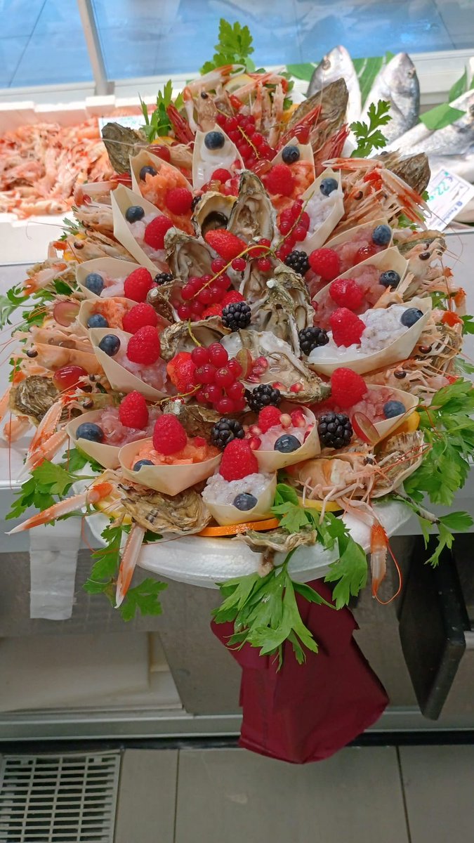 My cousin Mario works in a fish market in Italy, and spends all day making bouquets of seafood.