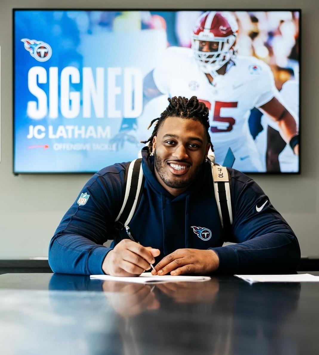 JC Latham signed a 4 year, $26,045,188 contract with the Tennessee Titans, including $15,761,956 signing bonus