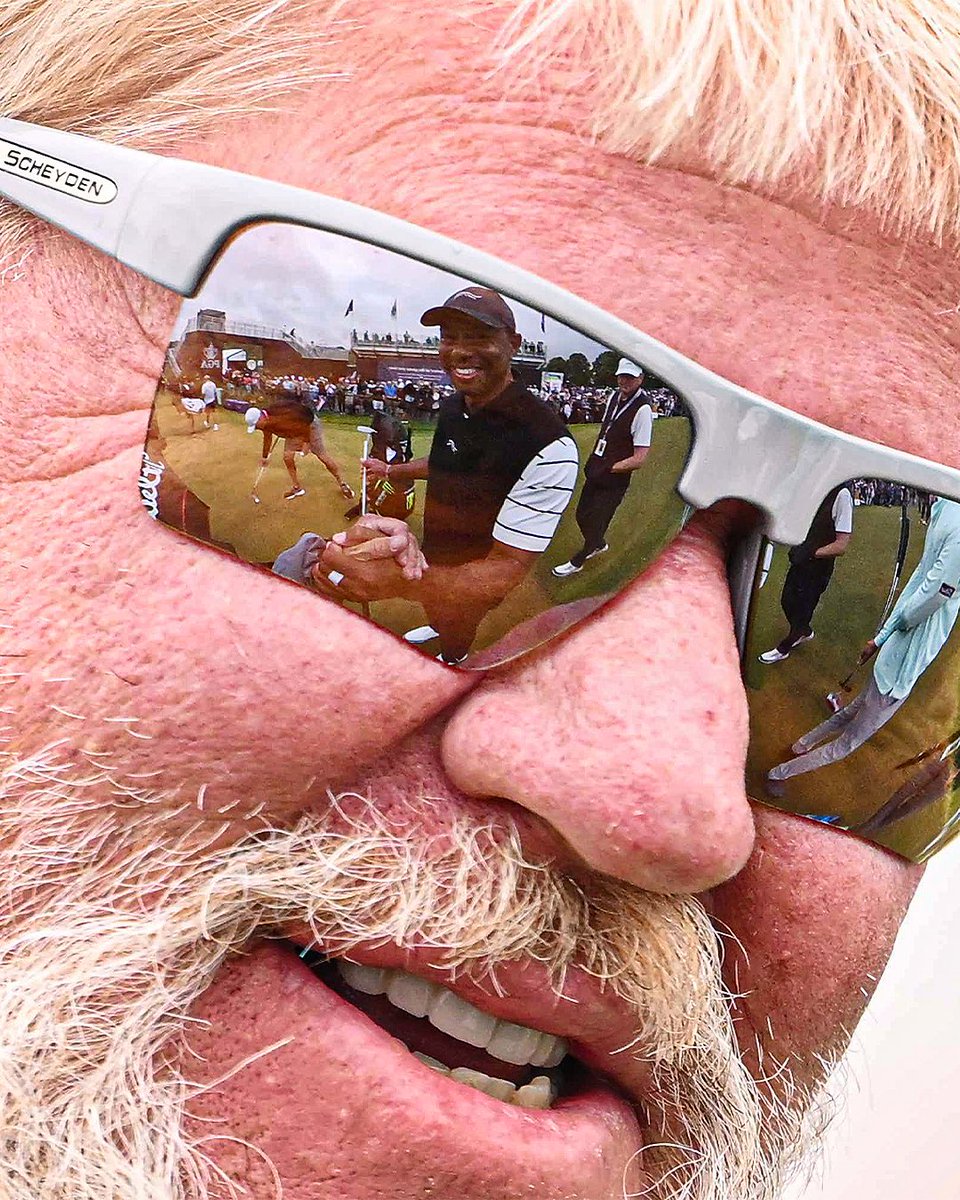 Pics don’t go any harder than seeing Tiger Woods dapping up John Daly through his shades