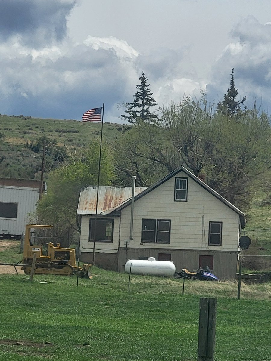 Ole Glory flying over cow camp