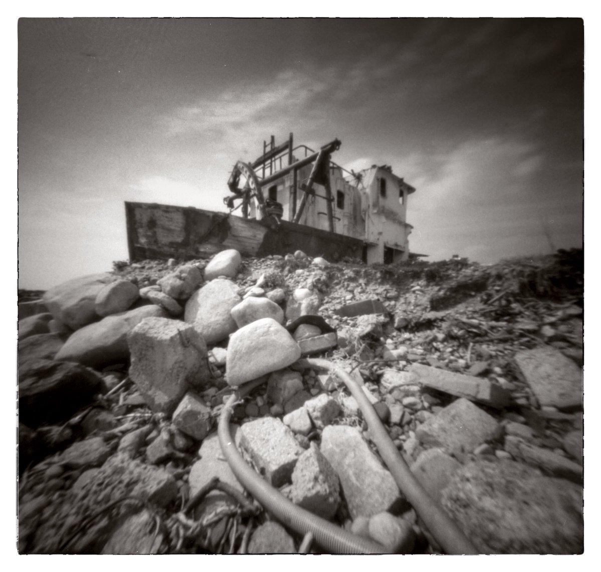 Land reclamation Northern Ireland style . Just leave the boat and fill in all around it . You couldn’t make it up . RSS 6x6 fomapan 200 and red filter . #pinhole #filmphotography
