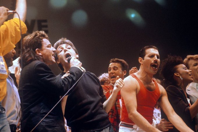 Paul McCartney with Bono, Andrew Ridgeley, George Michael, Freddie Mercury and David Bowie at Live Aid, 1985