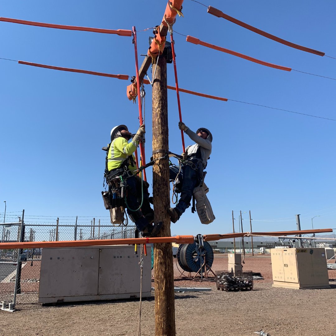 Lineworkers are highly skilled-professionals and we invest in the training of the next generation. Here are our apprentices are practicing techniques to connect and disconnect wires with hot sticks.
