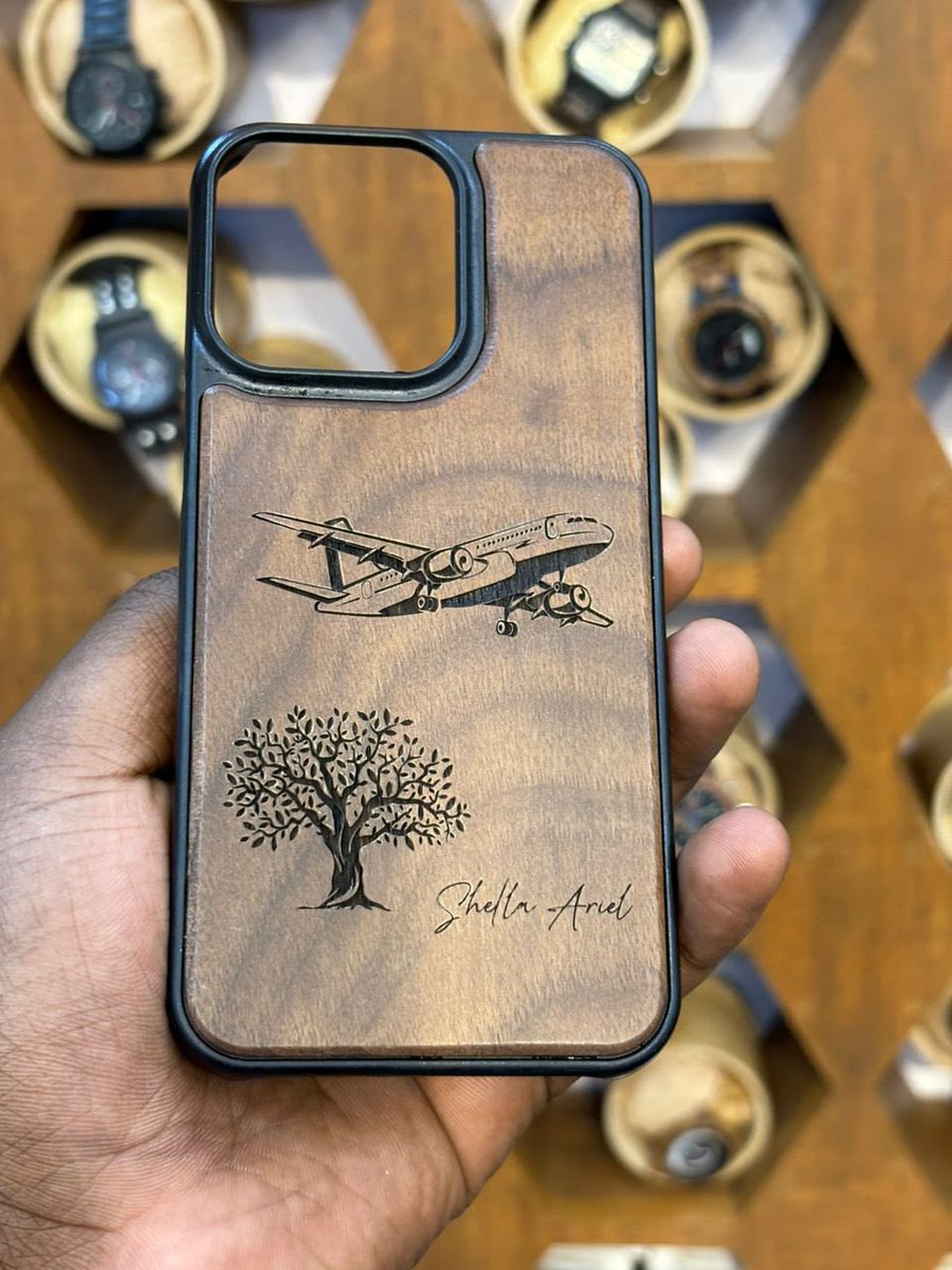 Engraved Wooden Phone Cases IPhone 12/12pro/Promax/13/13pro/Promax/14/14pro/Promax/15/15pro/Promax. Price:50,000ugx WhatsApp: 0707267566/@glarearmani #glarearmani