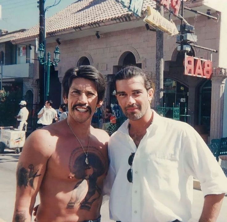 I showed this picture to my wife. 
She said 'isn't that Ying and Yang?'
'Do you mean Cheech and Chong?'
Belly laughing right now

Danny Trejo and Antonio Banderas on the set of Desperado in 1995.