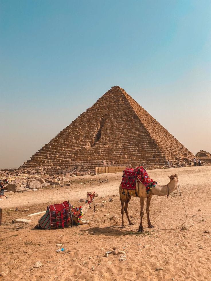 Explore the ancient wonders of Africa! The Pyramids of Giza in Egypt are a must-see, standing tall for centuries and captivating visitors with their grandeur and historical significance. A glimpse into the region's rich history #PyramidsOfGiza  #AncientWonders #RAS24UG