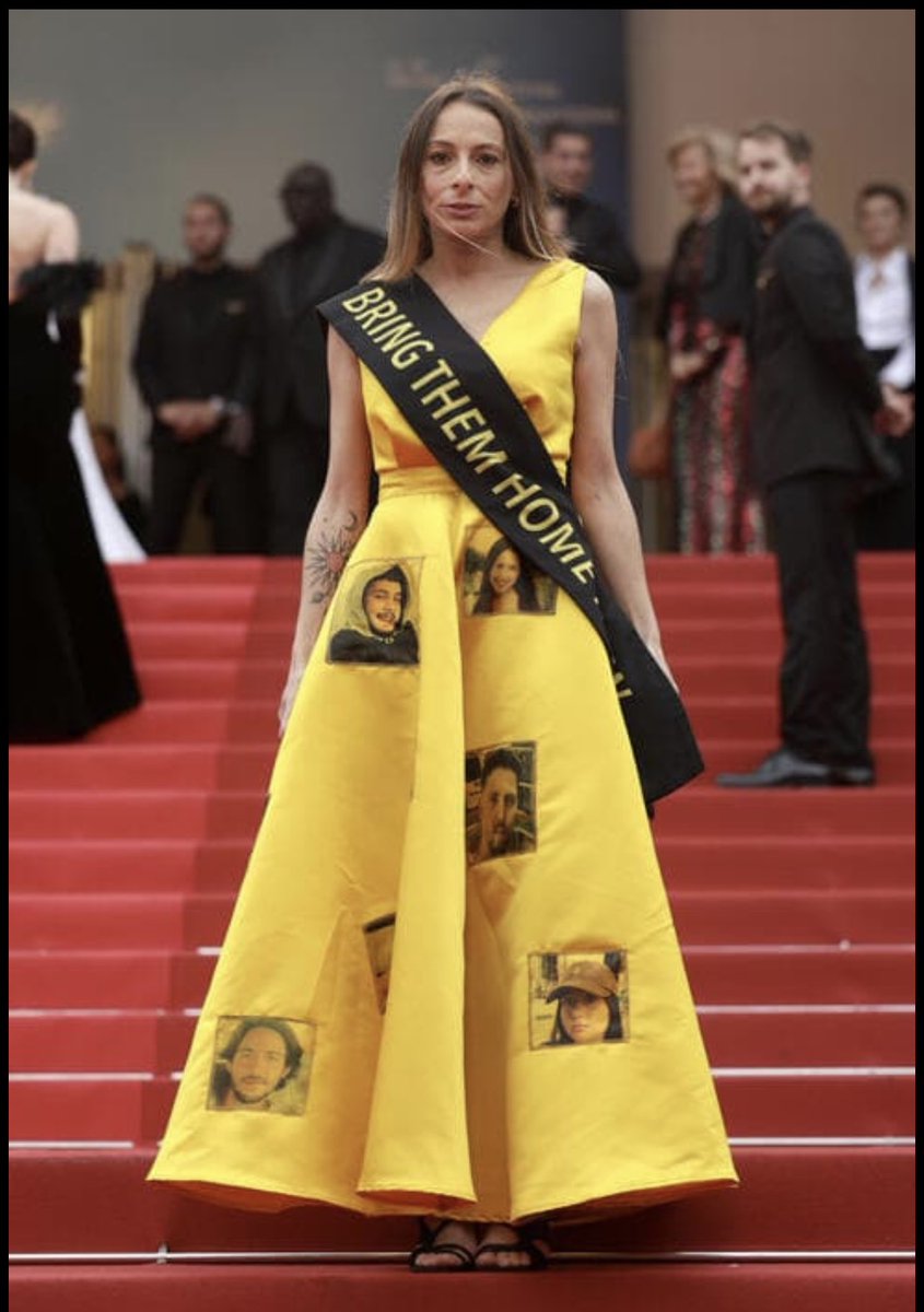 Laura Blajman-Kadar, survivor of the Nova festival massacare on #October7 arrived at the red carpet of Cannes film festival in a #BringThemHome yellow dress with pictures of hostages #BringThemHomeNow #BringThemAllHomeNow #ReleaseTheHostages #cannes2024 #FestivaldeCanne