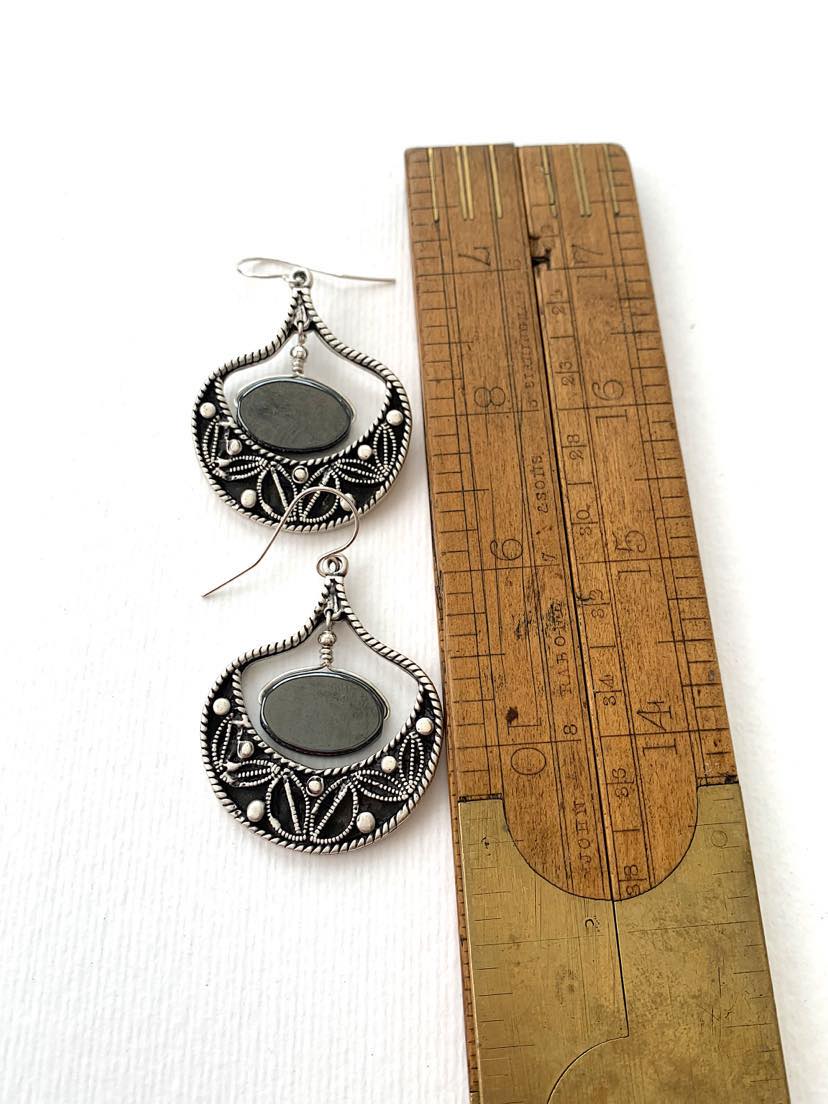 This pair of statement earrings feature Hematite and come with solid 925 Sterling Silver hooks, while the body of the earrings are silver plated throughout. The styling is ethnic/ bohemian. 

Purchase via Etsy: etsy.com/uk/listing/171…

#hematiteearrings #925sterlingsilver