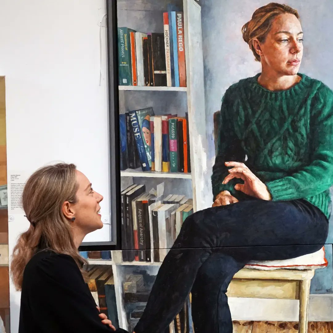 As @rbsagallery's Portrait Prize exhibition has opened, I wrote about what it's like to be an artist's muse. I was honoured to sit for @dannyhowesart who captured me relaxing at home, with my art books ruthmillington.co.uk/commissioning-…