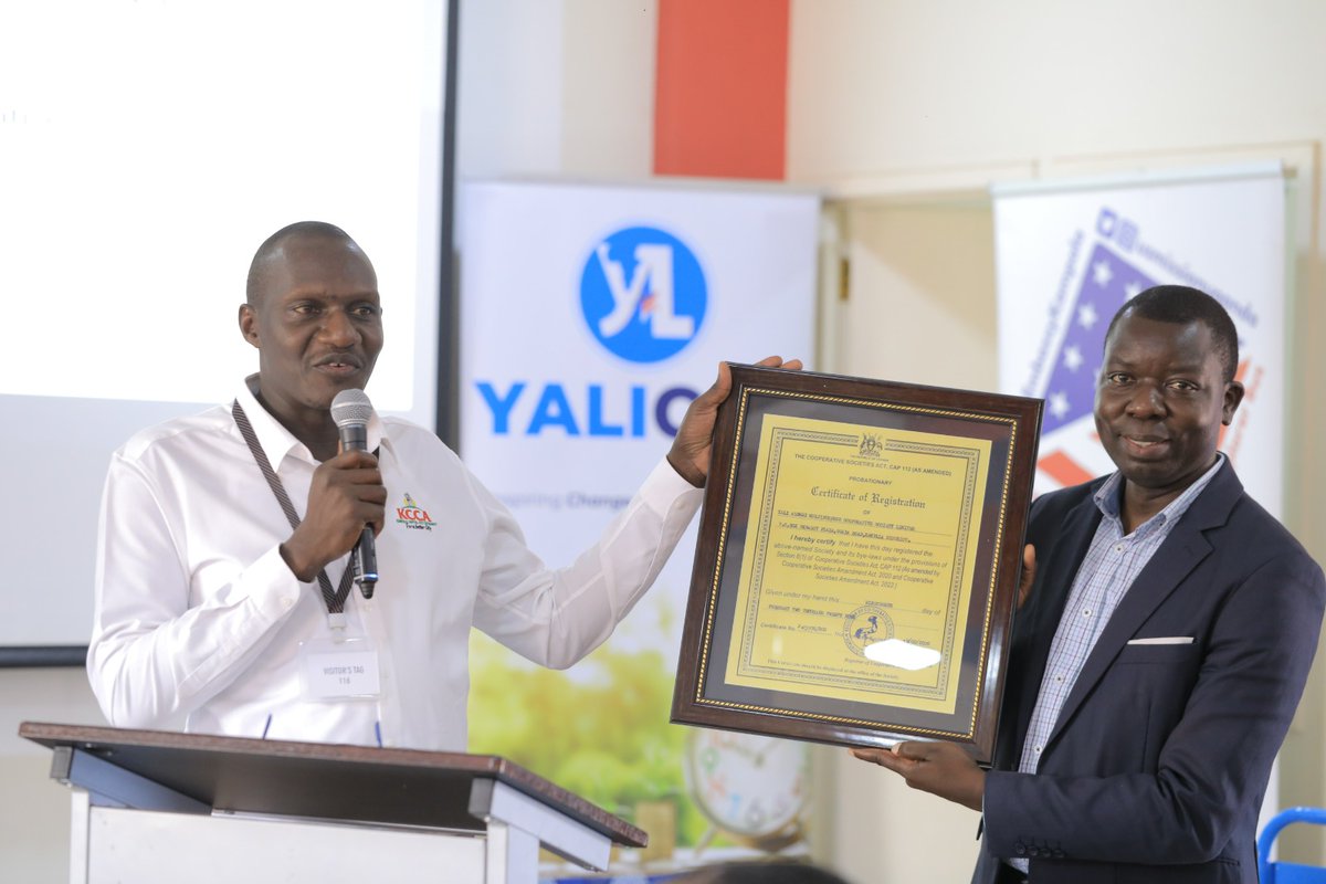 The Chairperson of YALI Multi-Purpose Cooperative Society Mr. Obbi Moses, receiving the YALICOS Certificate of Registration from the District Commercial Officer @YALIRLCAlumniUg @YALIRLCEA @USAmbUganda @USAID fostering financial empowerement among Yali members in Uganda.