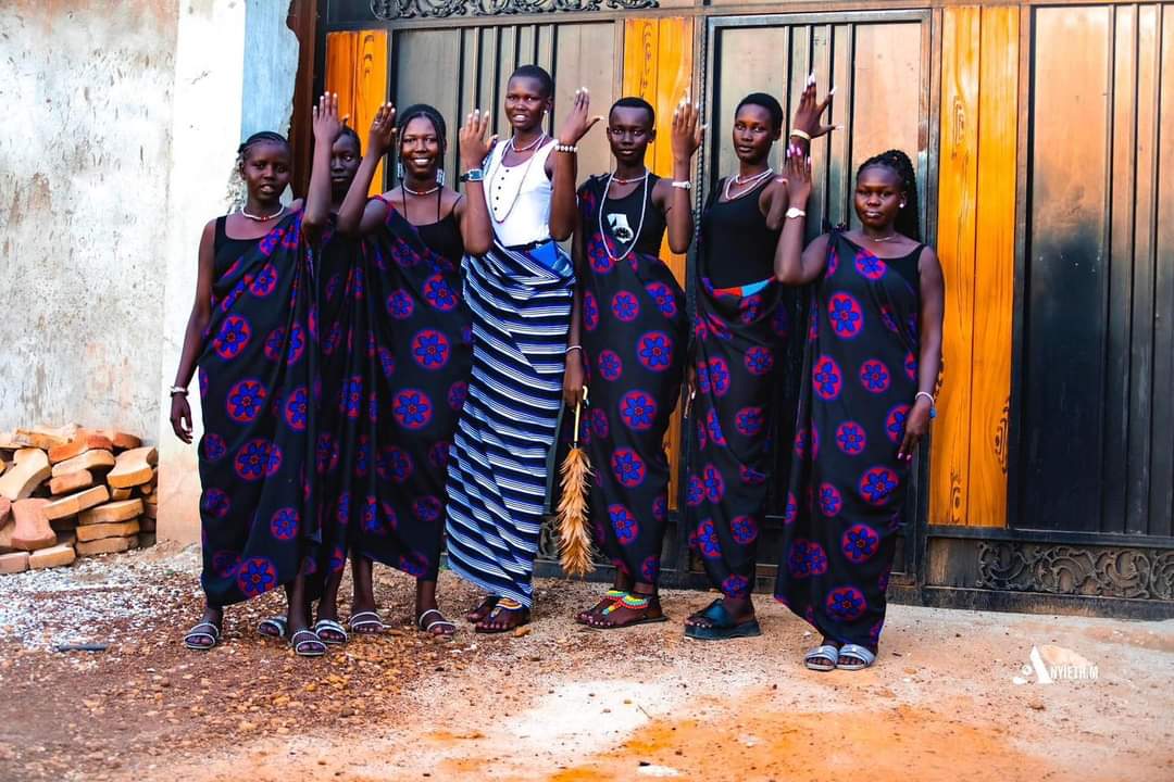 Meet Athiak Dau Riak, a 19-year-old girl who stands at 7 feet tall and most importantly a virgin, whose marriage has gone viral this week in South Sudan. Two men from different communities are competing for her, with one pledging 105 cows and 65 million South Sudanese pounds