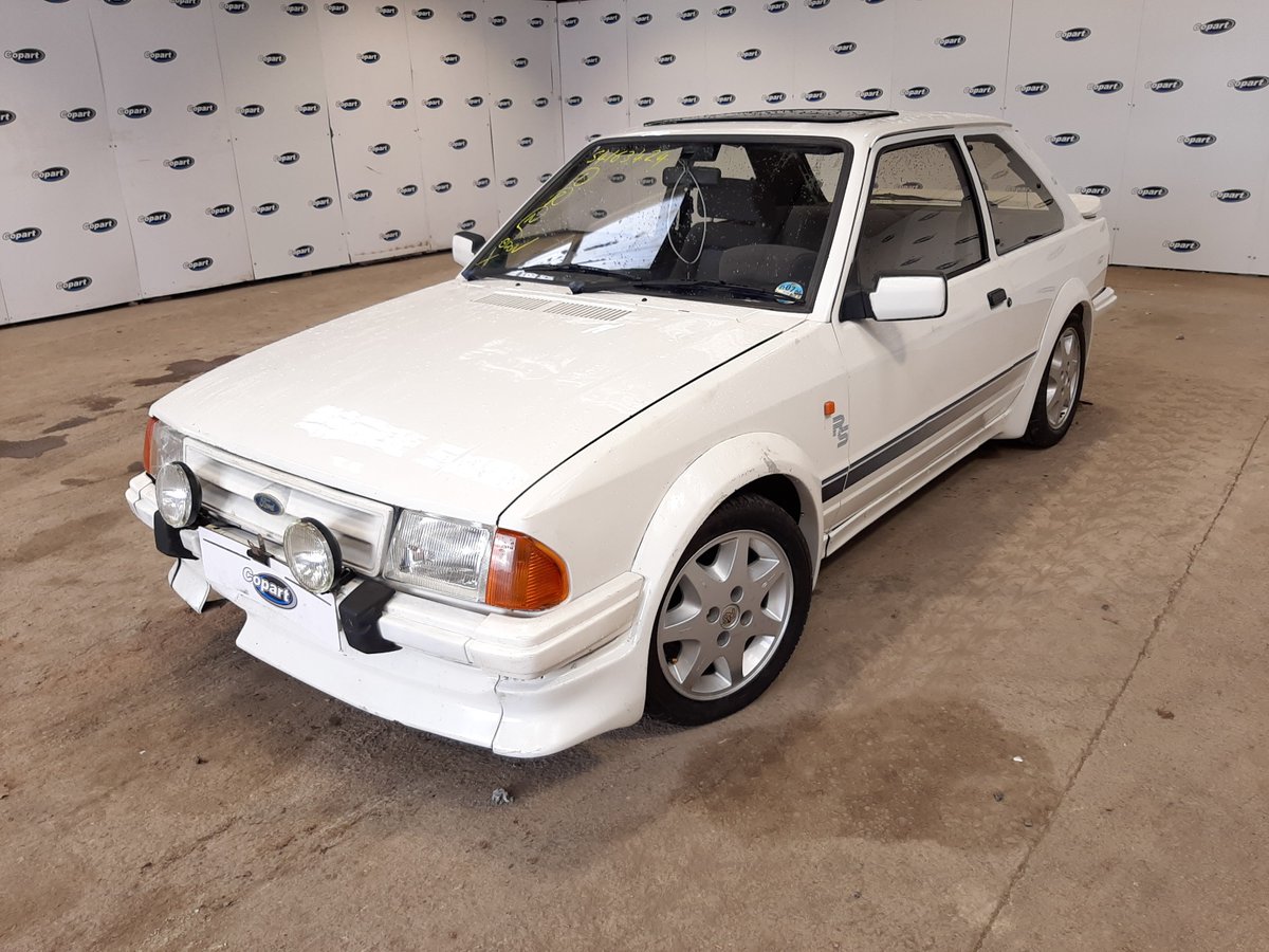 A Ford Escort RS was once good enough for Princess Diana...so this Ford is definitely worth restoring! 🛠️👸 Check out this CAT U 1985 Ford Escort RS - Book a Virtual Vehicle Viewing for an in-depth look at its condition! 🔍 View Lot page: ow.ly/4rJo50RFR2s