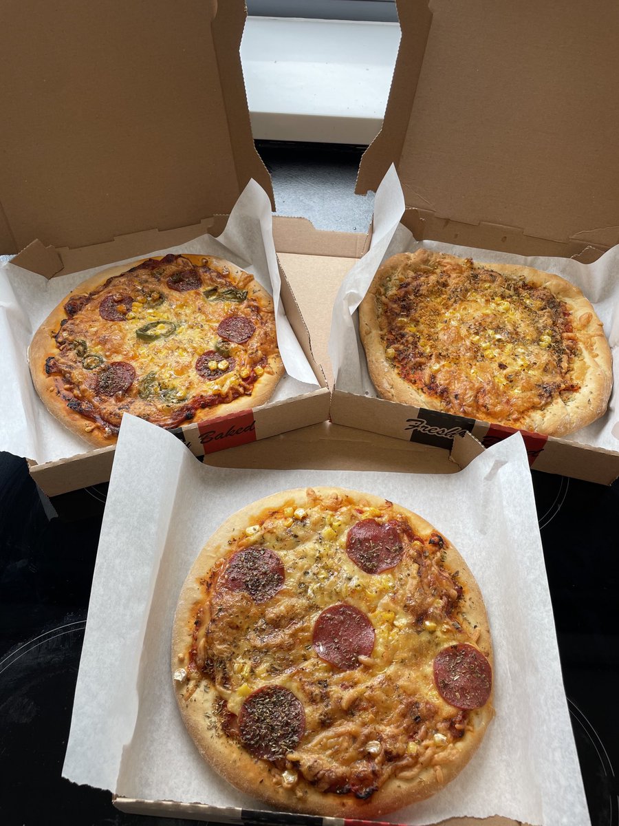 Pizzalicious! ⁦@holyhead_school⁩ Yr 10 FPN made these great looking pizzas fit for sale!  Now will they make it home 🤔