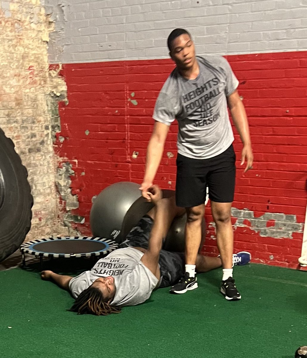 MacStephens's tweet photo. I’m pretty certain @SandaleJ223 would have laid in that spot until morning if @StubbsJayquan had not picked him up after a tough core workout 😂 #NotTheHeightsBlueprint https://t.co/Xtb22Dwaih