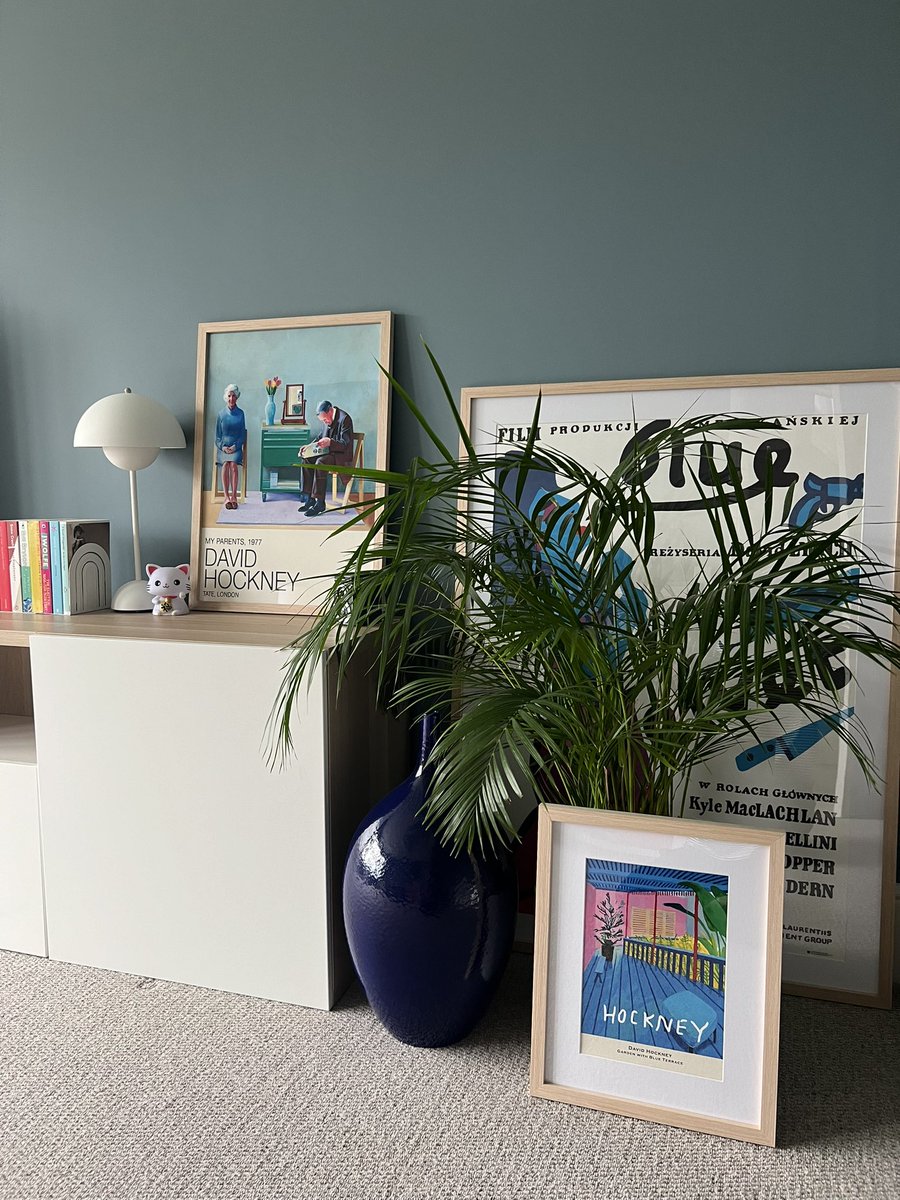 The Blue Room updates. A cute Hockney print. Some books. Now I just need another plant, the sofa to arrive, to add the pics to the wall, and find a bright pink balloon dog ornament and a Lego campervan.