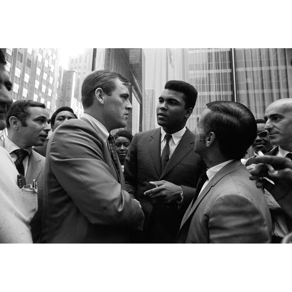 Heavyweight champion @rMuhammadAli and Detroit Tigers pitcher Denny McLain outside of the Equitable Building in midtown Manhattan. Manhattan, New York. August 25, 1968. #NeilLeifer #NewYork #MuhammadAli #DetroitTigers #DennyMcLain #photography