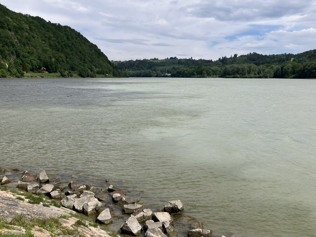 River mouth of the Danube and Inn River in Passau, Germany. 
Two complete different colors. Interesting what the rivers carry with them.