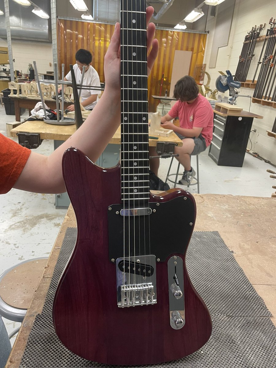 And the purpleheart electric guitar is complete! Wood Tech class. Completely from scratch, cnc mill cut body. 3D printed pick guard. Nice way to end the year for this student! #cte #stem #STEMeducation #wood #music #guitar #cnc #achs #sequoits