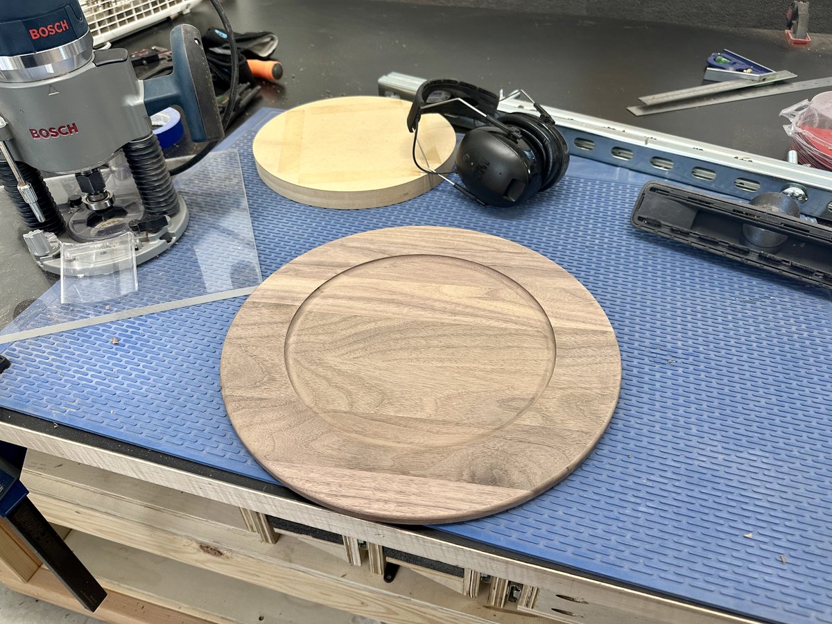 Bought some wood charger plates (they're like fancy placemats) from Crate & Barrel, but returned them after thinking 'Pssht, I'll just make those myself!'

So instead of spending $25/charger, I spent nearly $0/charger in materials and probably $100/charger in my time making them