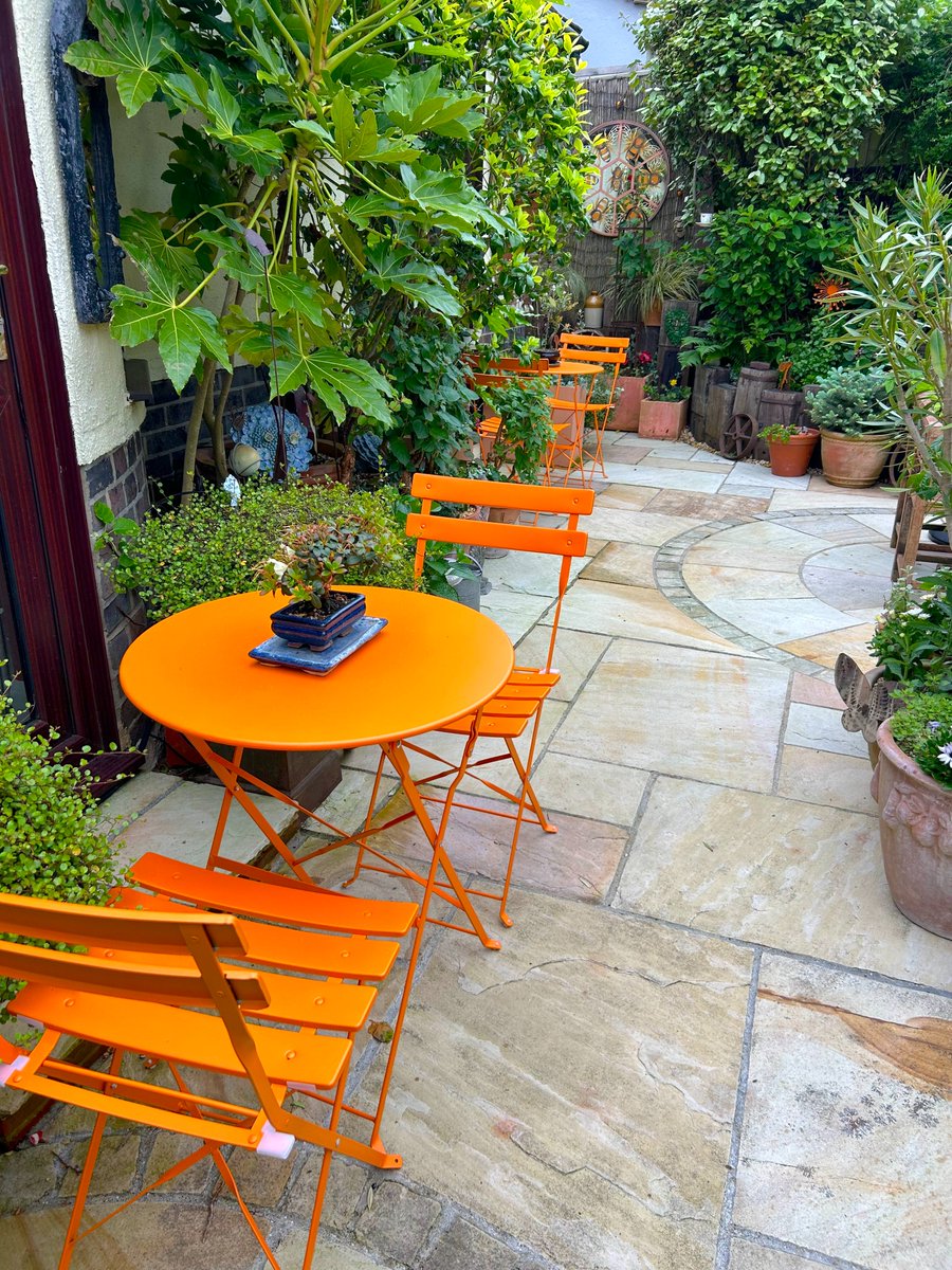 Loving the fabulous 'zing' the new orange bistro sets make on the patio. driftwoodbysea.co.uk #sussex #gardening