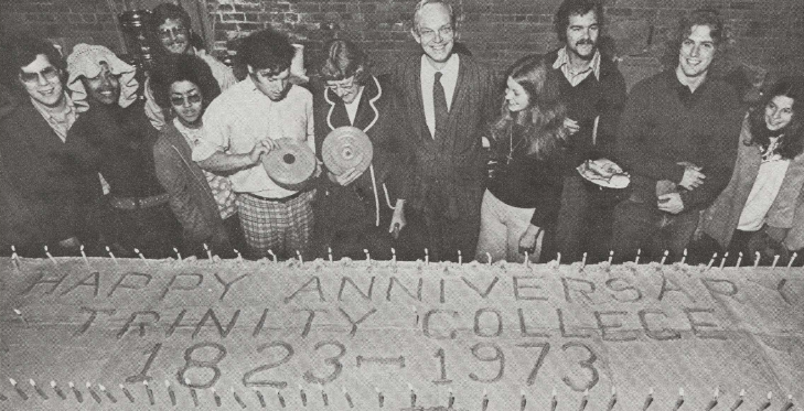 Celebrating 200 years this Charter Day by revisiting our 150th anniversary with a memory as sweet as the 16-foot cake we shared! Spot familiar faces in the photo? #TogetherWeTrin #Trin200 #BantamProud💙💛