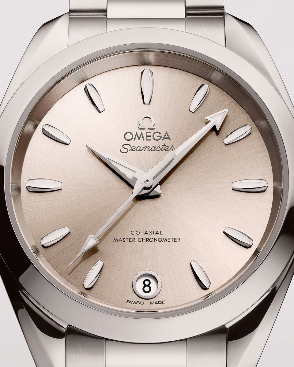 OMEGA Precision. The 34 mm Seamaster Aqua Terra Shades with its sandstone lacquered and sun-brushed dial. omegawatches.com/OMEGAPrecision #OMEGAPrecision