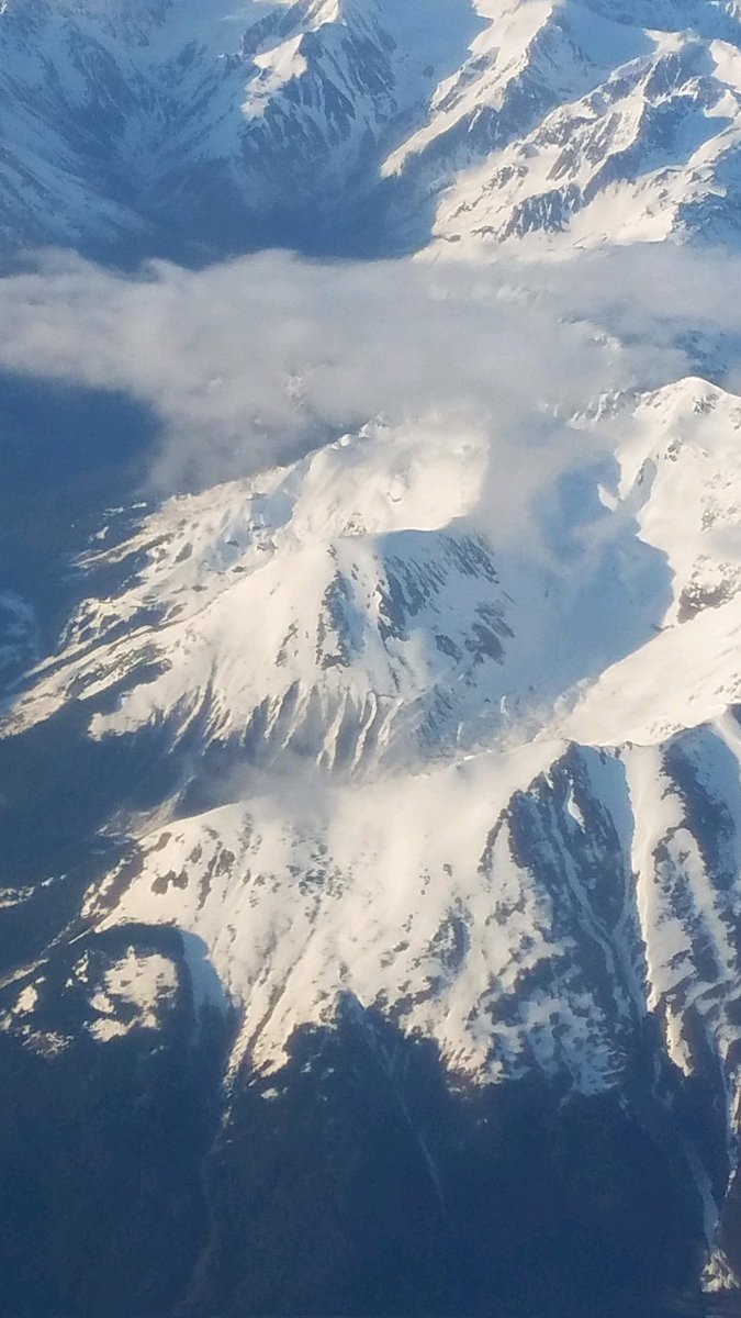 One of the sisters went back home to spend some vacation time with her family. She snapped this from the plane. Guess where she grew up.