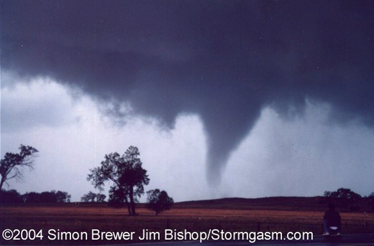 #weatherpicofday @StormgasmJim films a cone-shaped tornado over ranchland near the community of Amelia, Nebraska OTD 20 years ago, 16 May 2004. Soon after this pic, we had to bolt, the tornado passed over this location. w/ Mark McGowen #newx