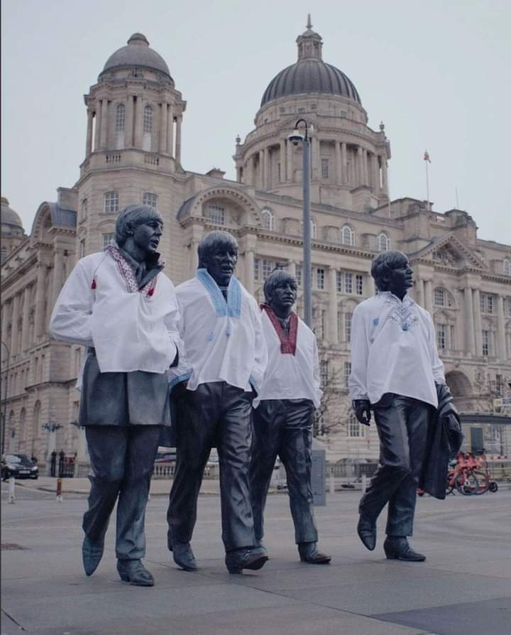 In Liverpool, the monument to the Beatles was dressed up in embroidery.