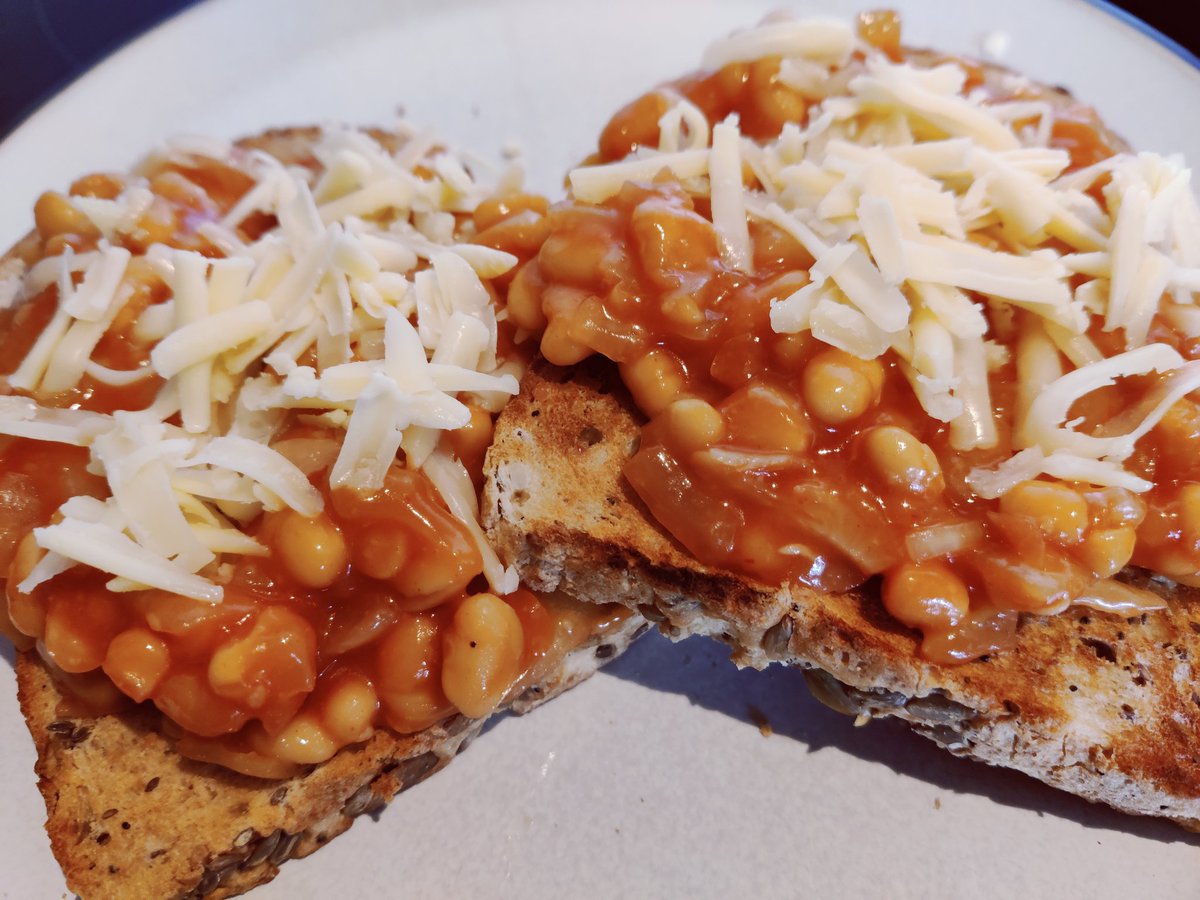 When having beans on toast for tea one should pimp up one's beans: fried onion and garlic, tomato purée, a generous sprinkle of hot chilli powder and served with grated extra mature cheddar. 😁