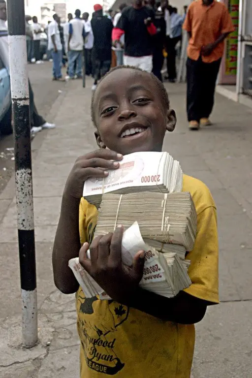 IndianSwede's tweet image. This boy is carrying about 10 million worth of zimbabwean dollar, to get a load of bread.