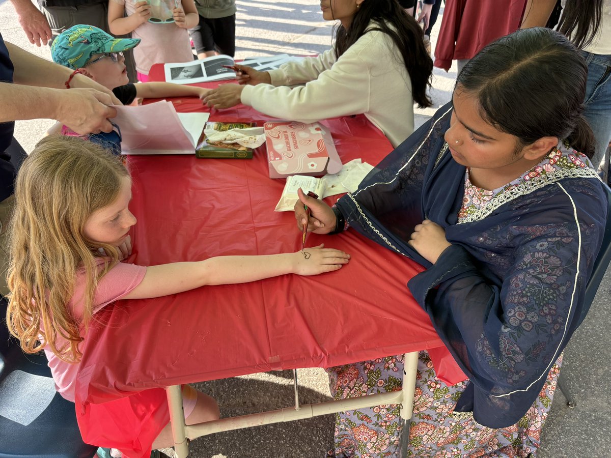 MapleGrovePS's tweet image. Henna and face-painting is happening now at the Maple Grove Fun Fair!