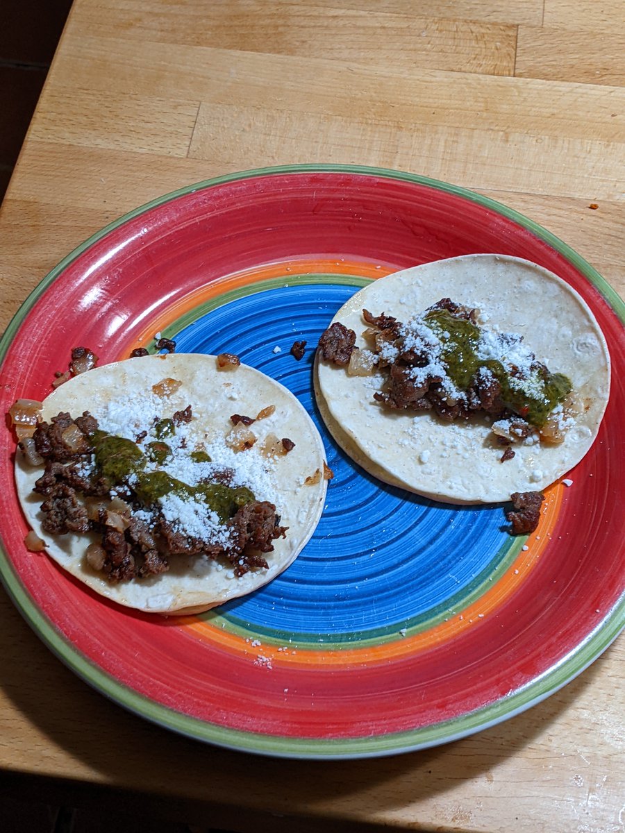 Steak taco kit with onions, cojita cheese, chimichurri sauce, and corn tortillas. Would have preferred flour tortillas, but it was what came with the kit. #twittersupperclub