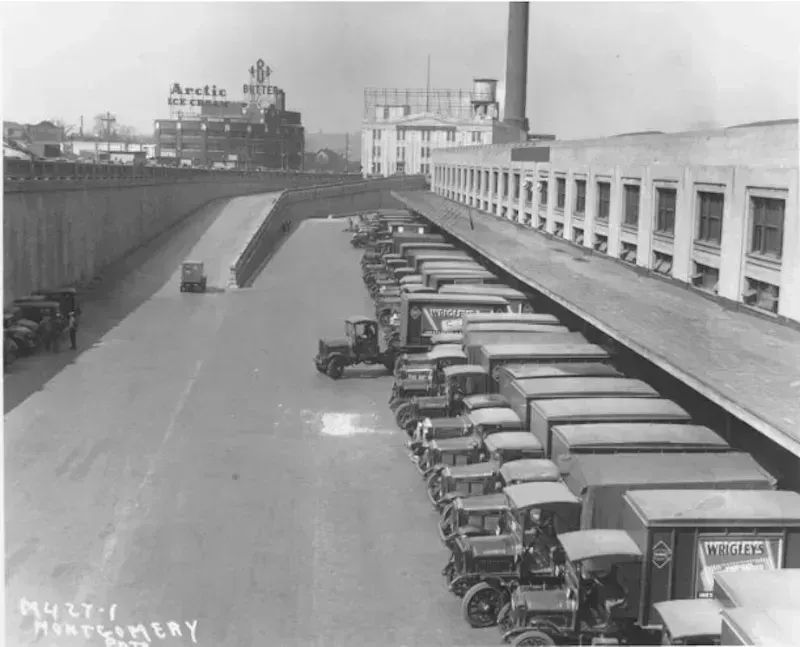 From 1930, trucks lined up at Union Station's Railway Express Agency facility. The facility extended to the west of Union Station for 1/5 mile, mostly underground, and handled everything from frozen steaks to zoo animals and bags of coins going to and from the KC Federal Reserve