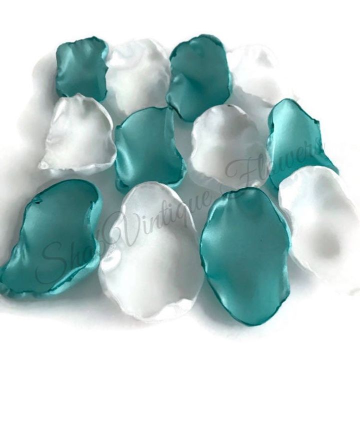 Add a splash of enchantment to your special day with light turquoise and white flower petals, perfect for flower girls and summer wedding decor!… dlvr.it/T6zgN2 #weddingcolors #bridal #weddingdecor #flowerpetals #bettertogether #weddingplanning #bridetobe #celebrate