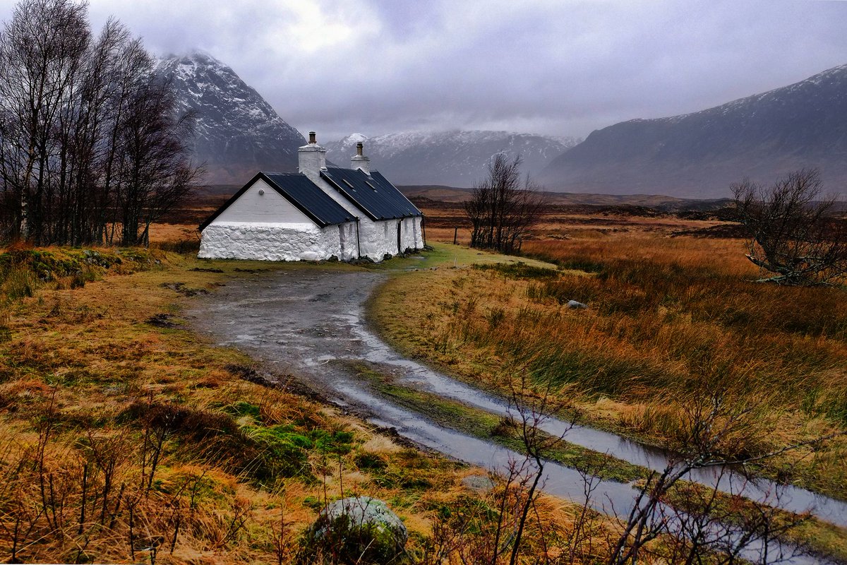 Rain or shine, enchantment included. Black Rock cottage in the highlands of Scotland. NMP.