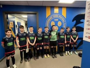 Football celebration What a fantastic opportunity for Radbrook U11 boys to be able to take part in the, U11 school final against Redhill, on Sunday at the Shrewsbury Town . They played really well and received a runners up medal presented by the chairman of Shropshire FA.